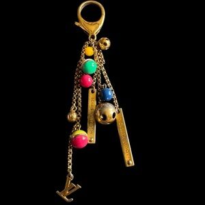 Authentic Louis Vuitton Porte Cles grelots bag charm and key holder